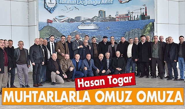 Hasan Togar muhtarlarla omuz omuza